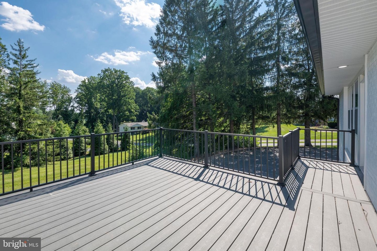 Chapel Ridge — deck with dark railings overlooking the yard