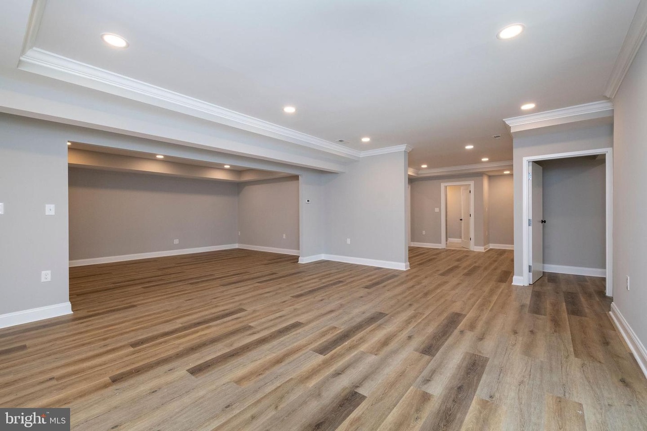 Chapel Ridge — finished lower-level living space with recessed lighting